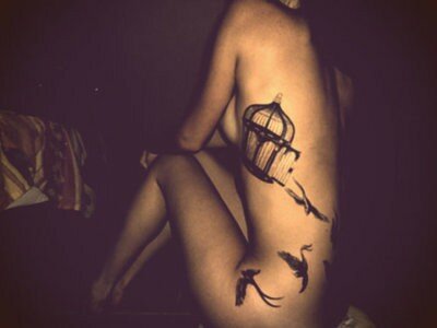 beautiful tattoos birds, escape from cage